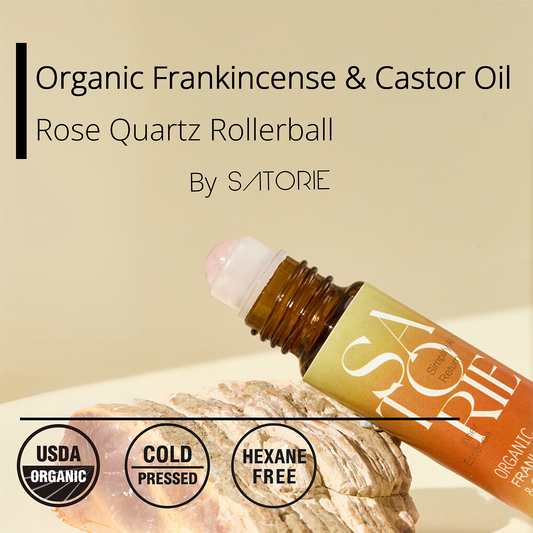 Sаторie Organic Frankincense & Castor Oil Rose Quartz Rollerball on a beige background