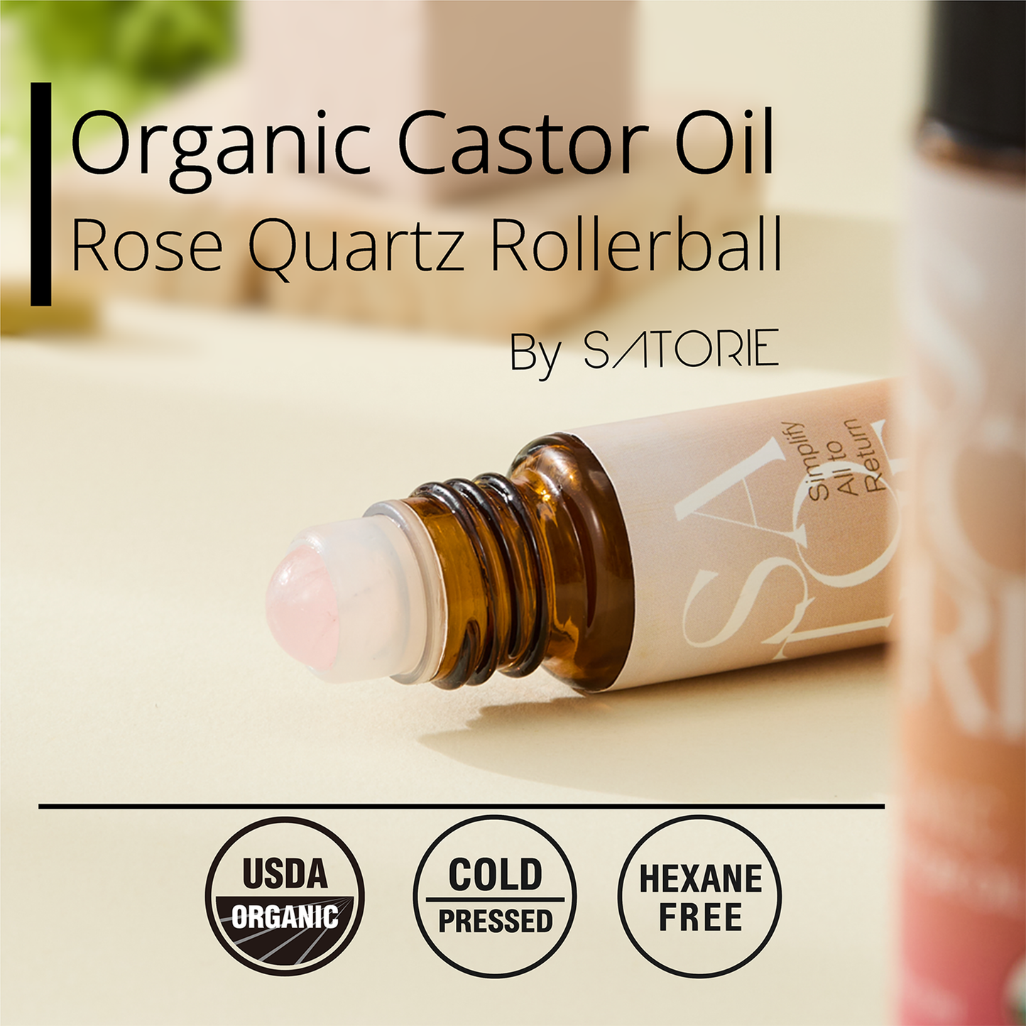 satorie Organic Castor Oil Rose Quartz Rollerball on a light background